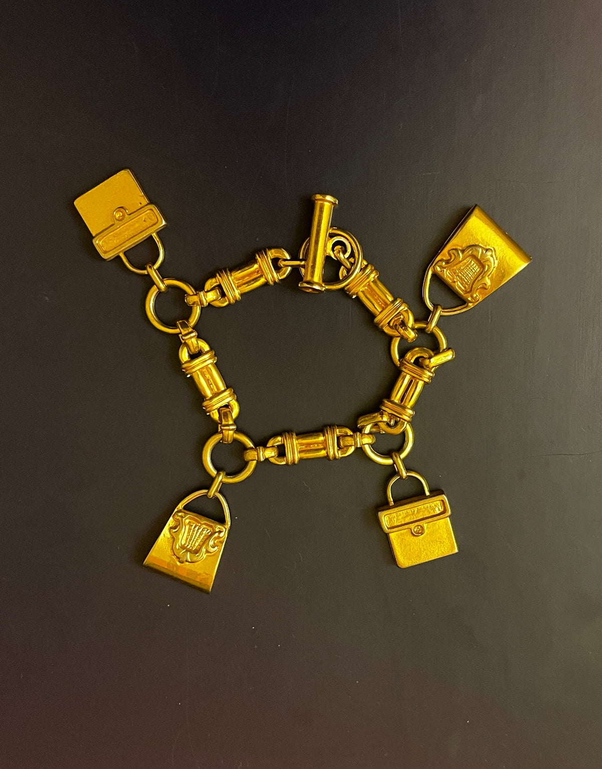 Bracciale vintage anni '90 con charms a forma di borsa