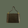 Borsa Andrea Pfister anni '70/'80 in camoscio nero con specchio e portapettine
