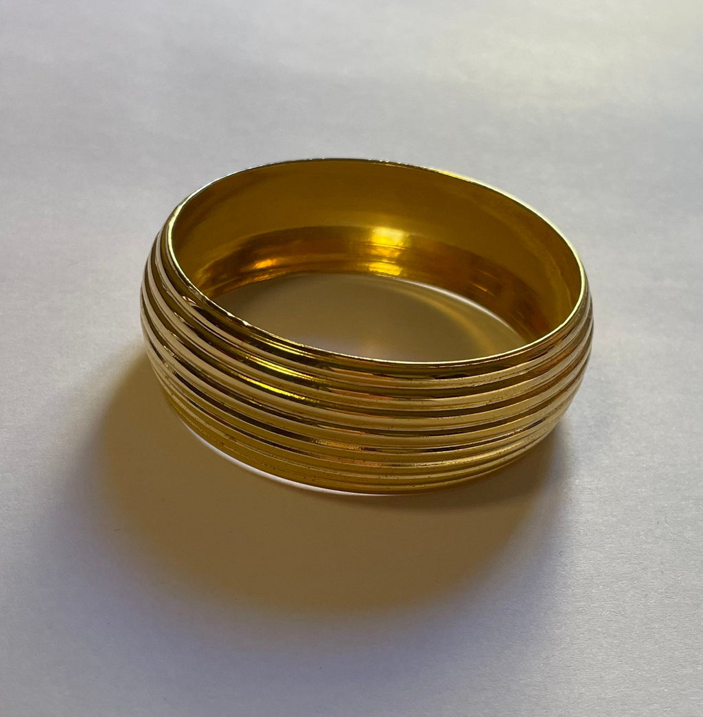 Italian 1980s golded kurled bracelet