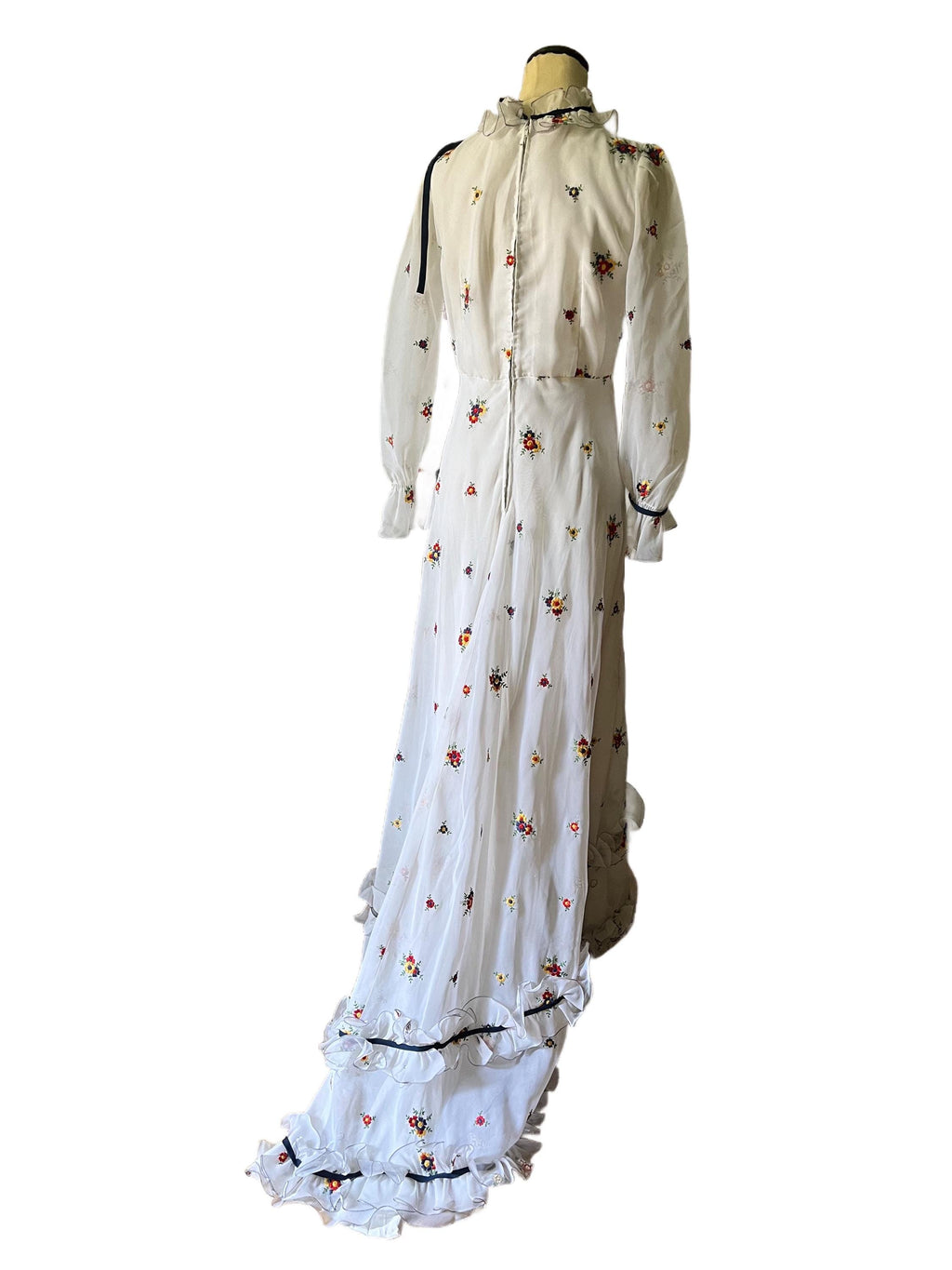 1970 white and flowered long train dress