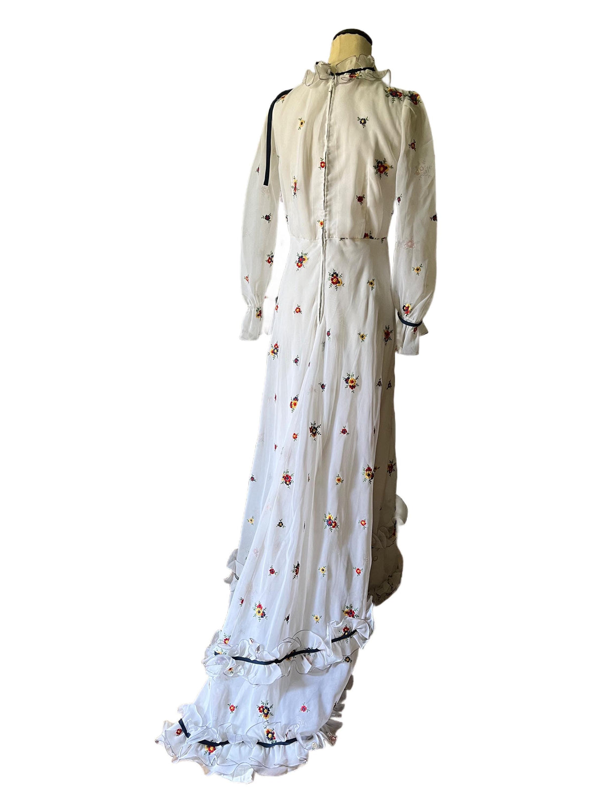 1970 white and flowered long train dress