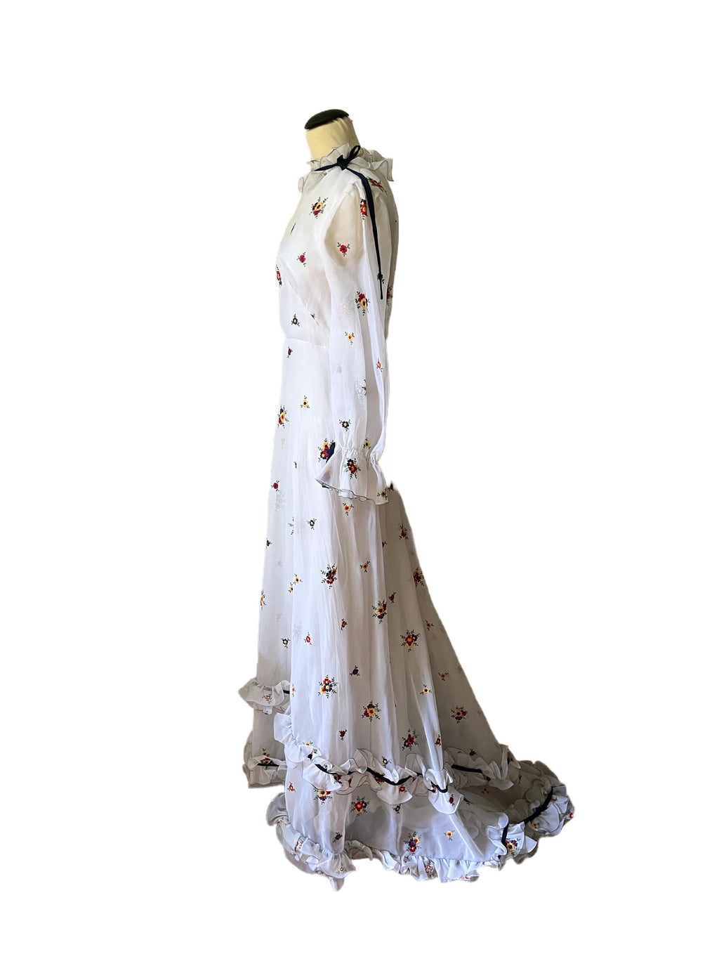 1970 white and flowered long train dress