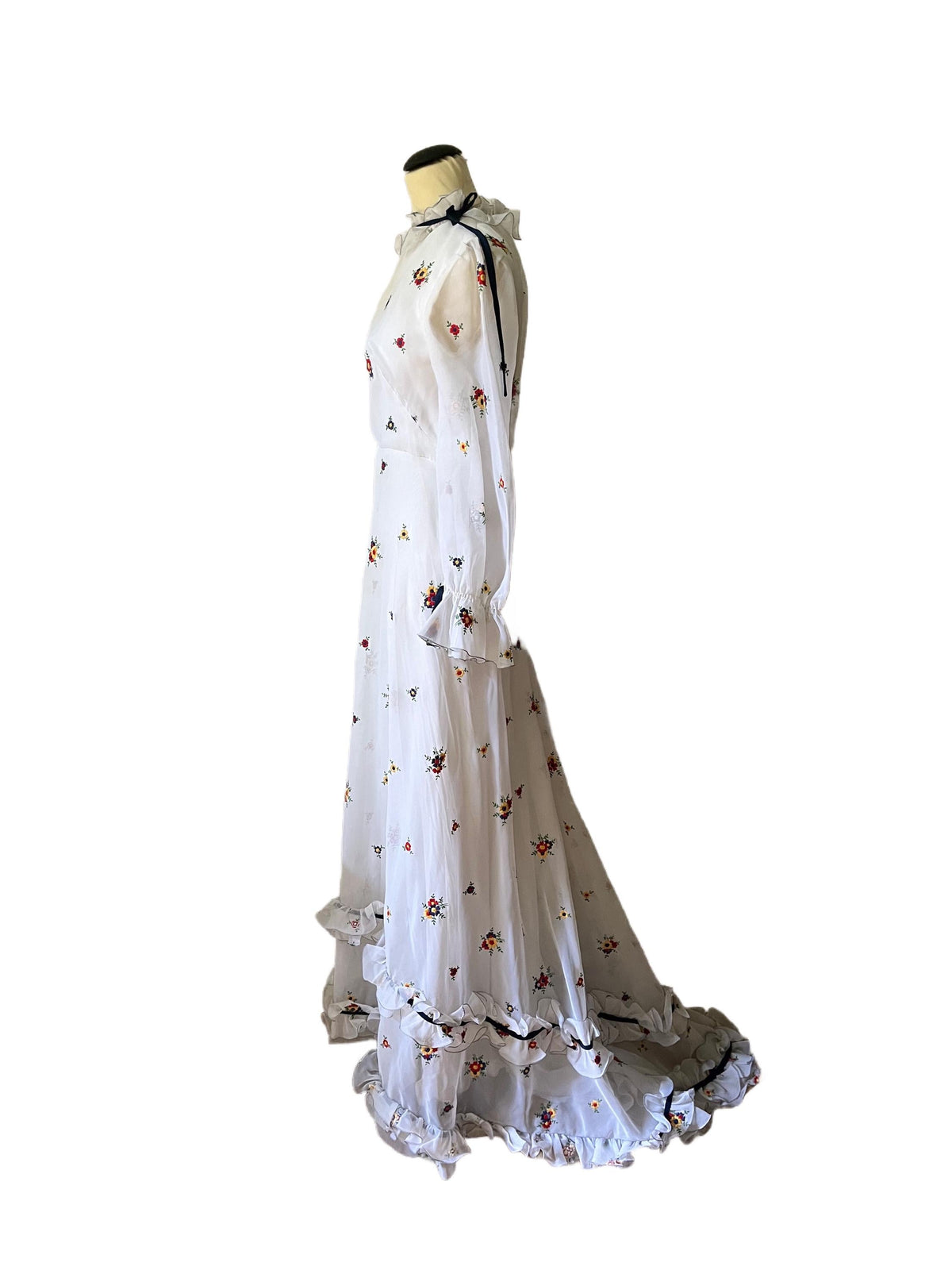1970 white and flowered long train dress