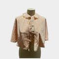 Raffinata pettineuse degli anni ’40 in seta rosa.