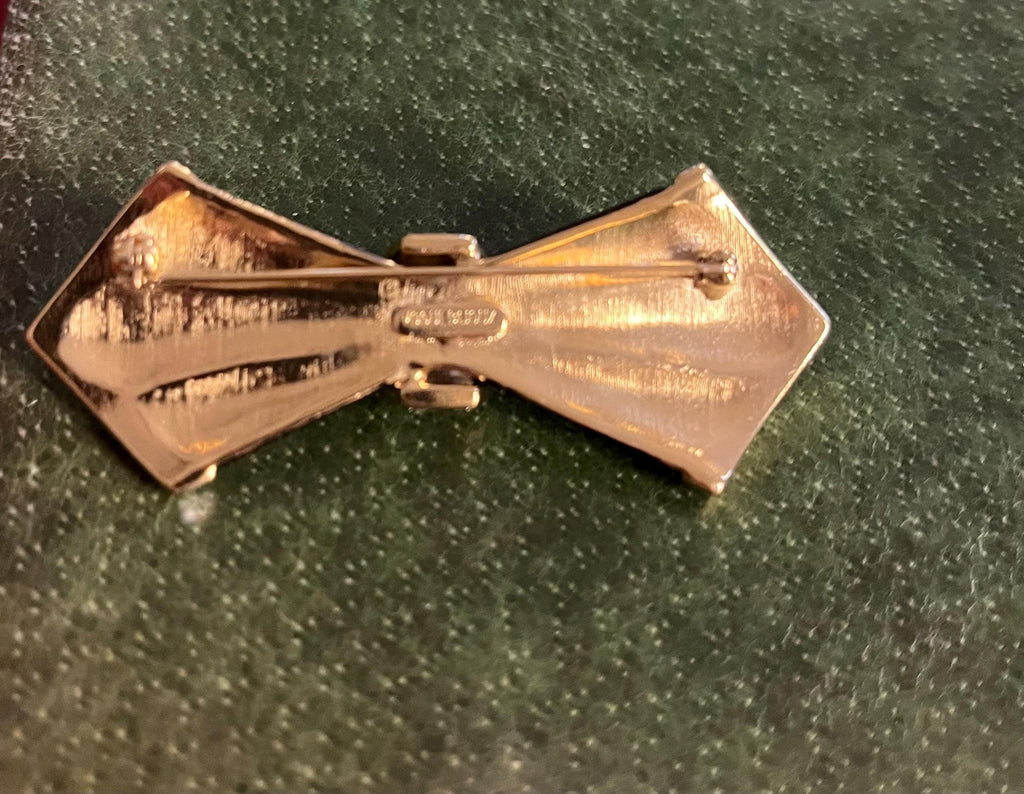 Spilla vintage anni ’80 Vogue Bijoux in smalto nero e strass a forma di fiocco