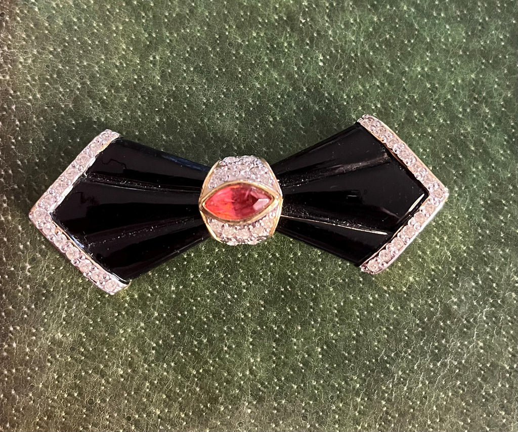 Spilla vintage anni ’80 Vogue Bijoux in smalto nero e strass a forma di fiocco