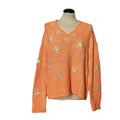 Orange Flowers  Maglia Mira Mikati arancione con motivo floreale