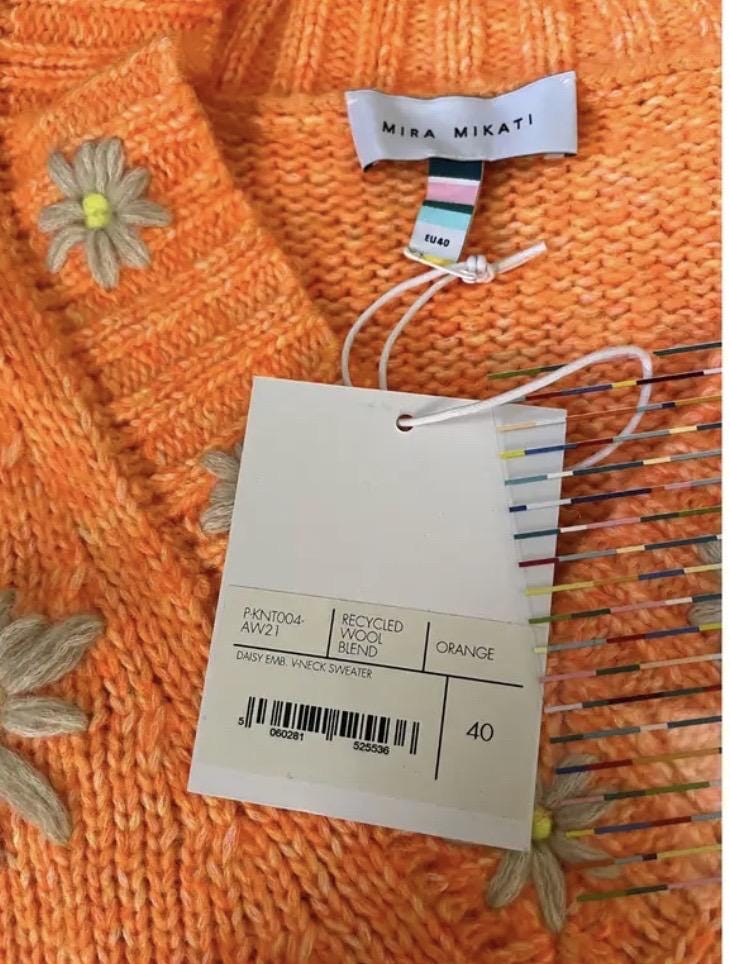 Orange Flowers  Maglia Mira Mikati arancione con motivo floreale